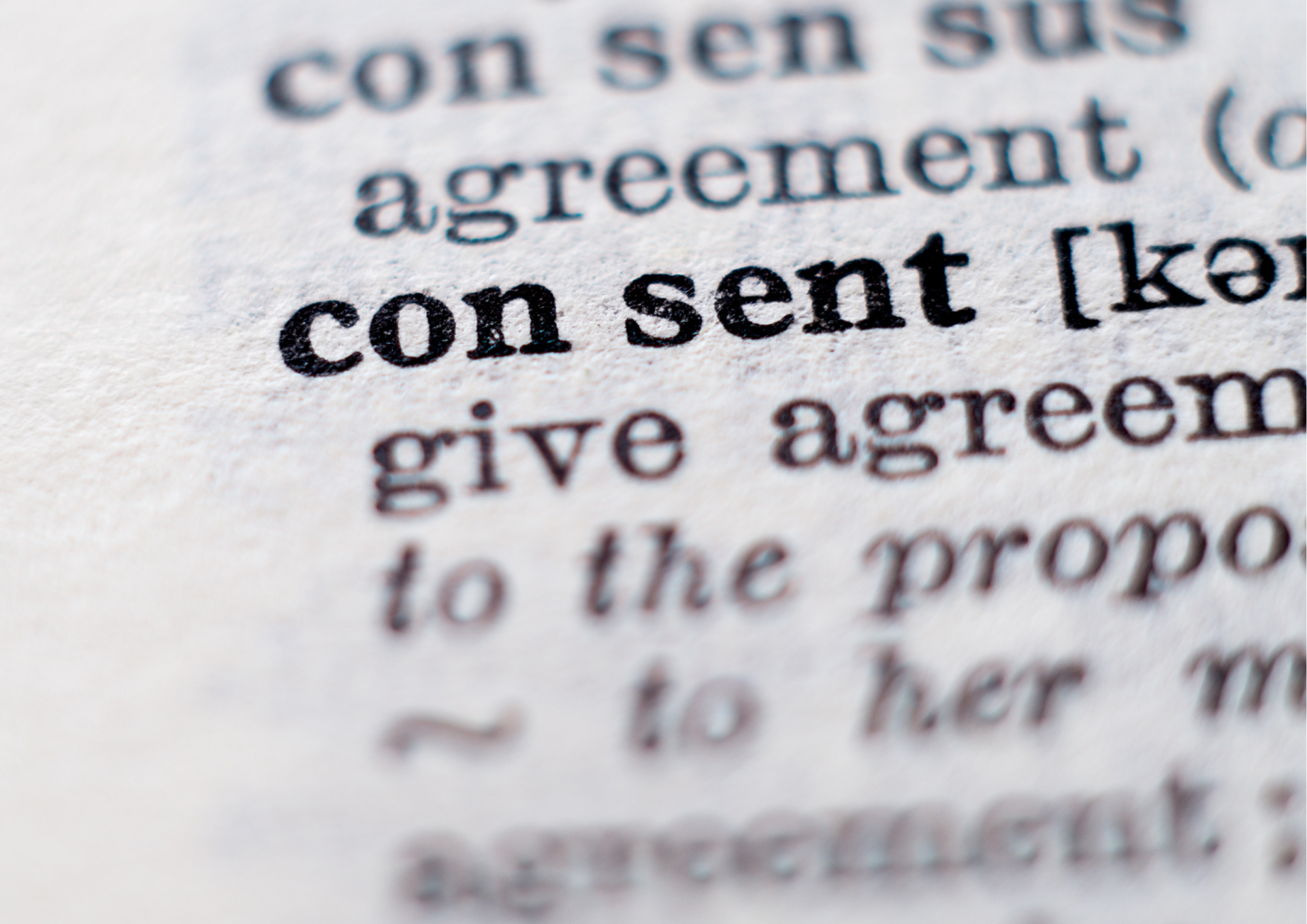 Close up of a dictionary entry for the word 'consent'.