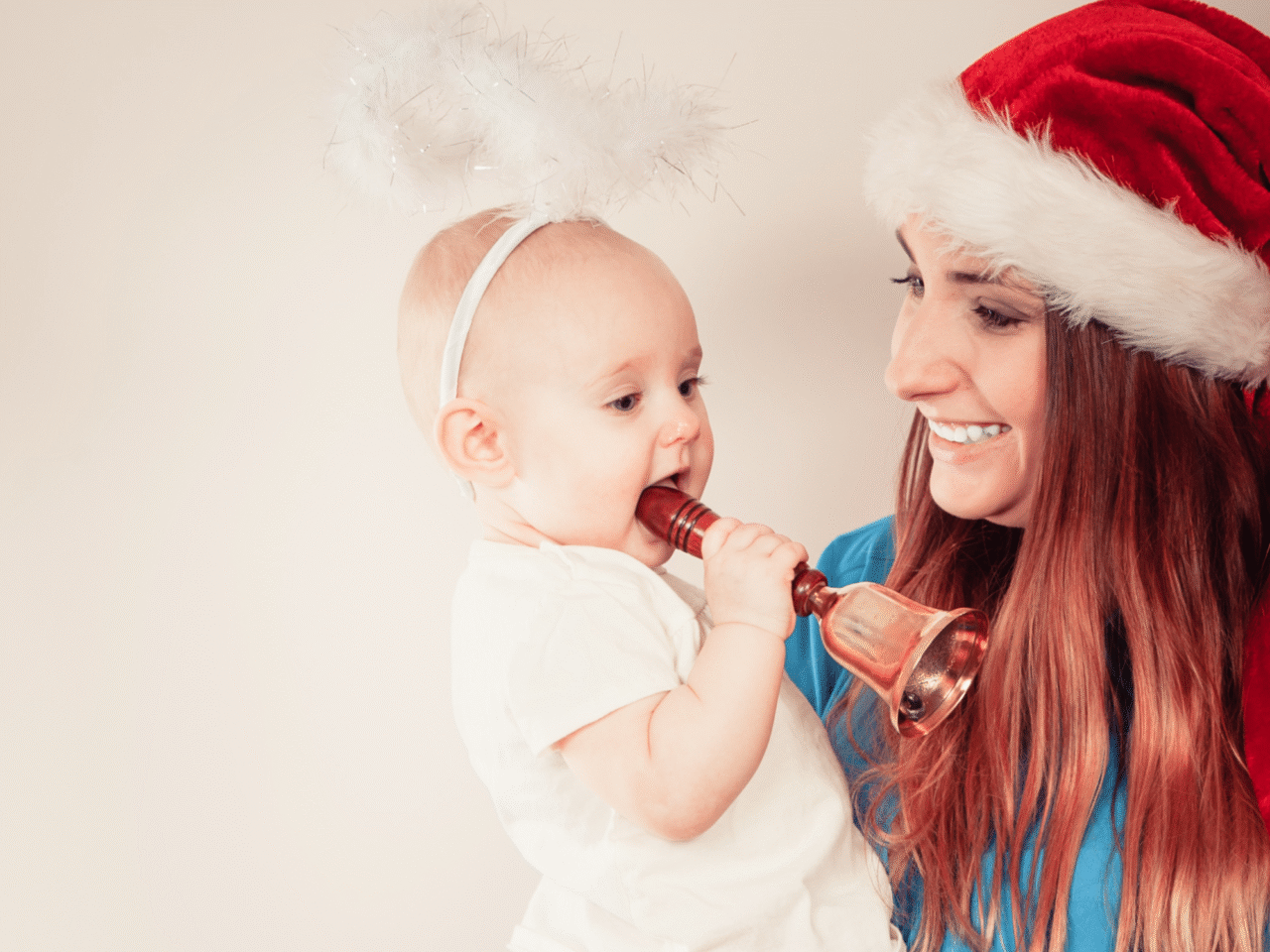 Mother smiling at child at Christmas